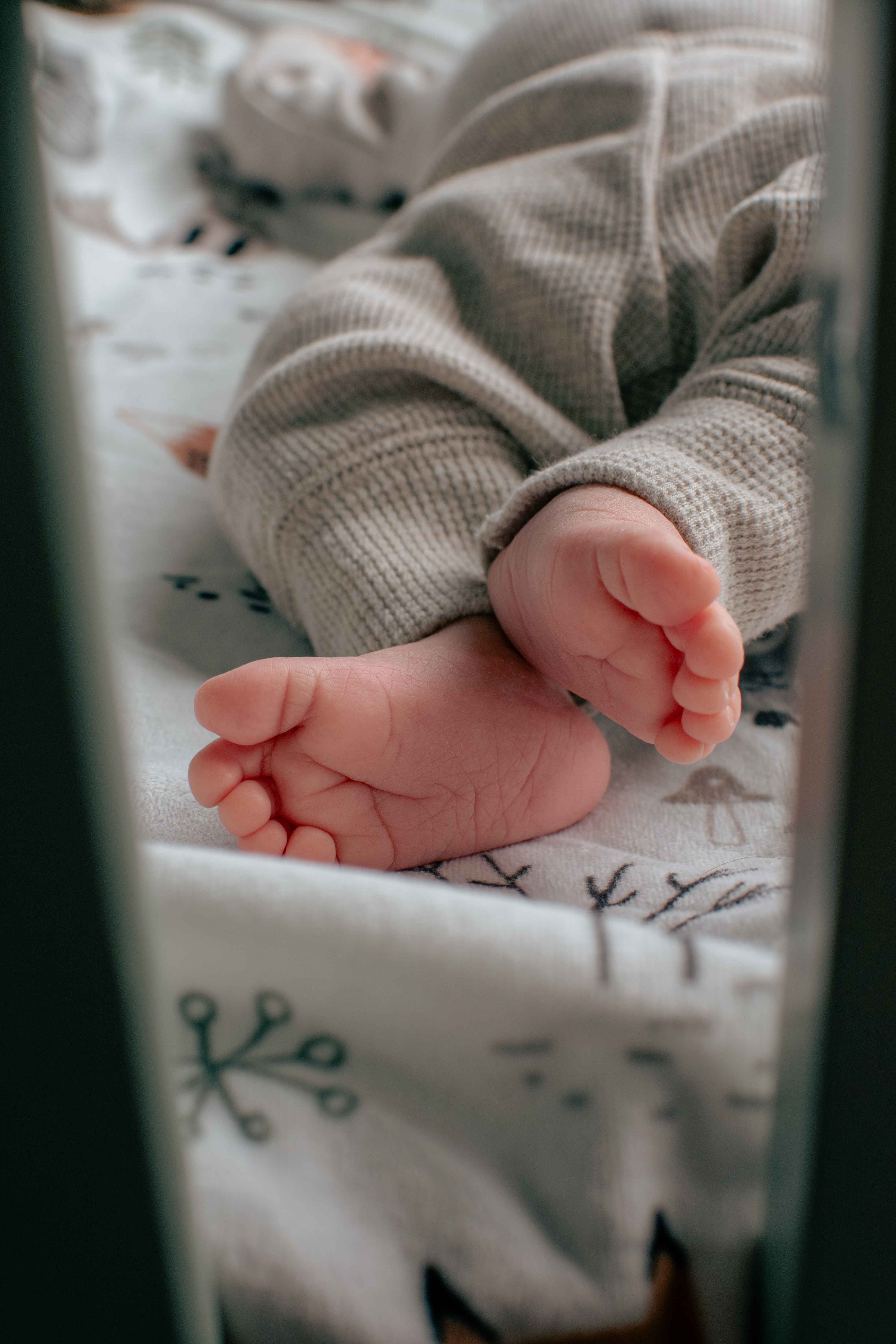 Tiny newborn feet closeup