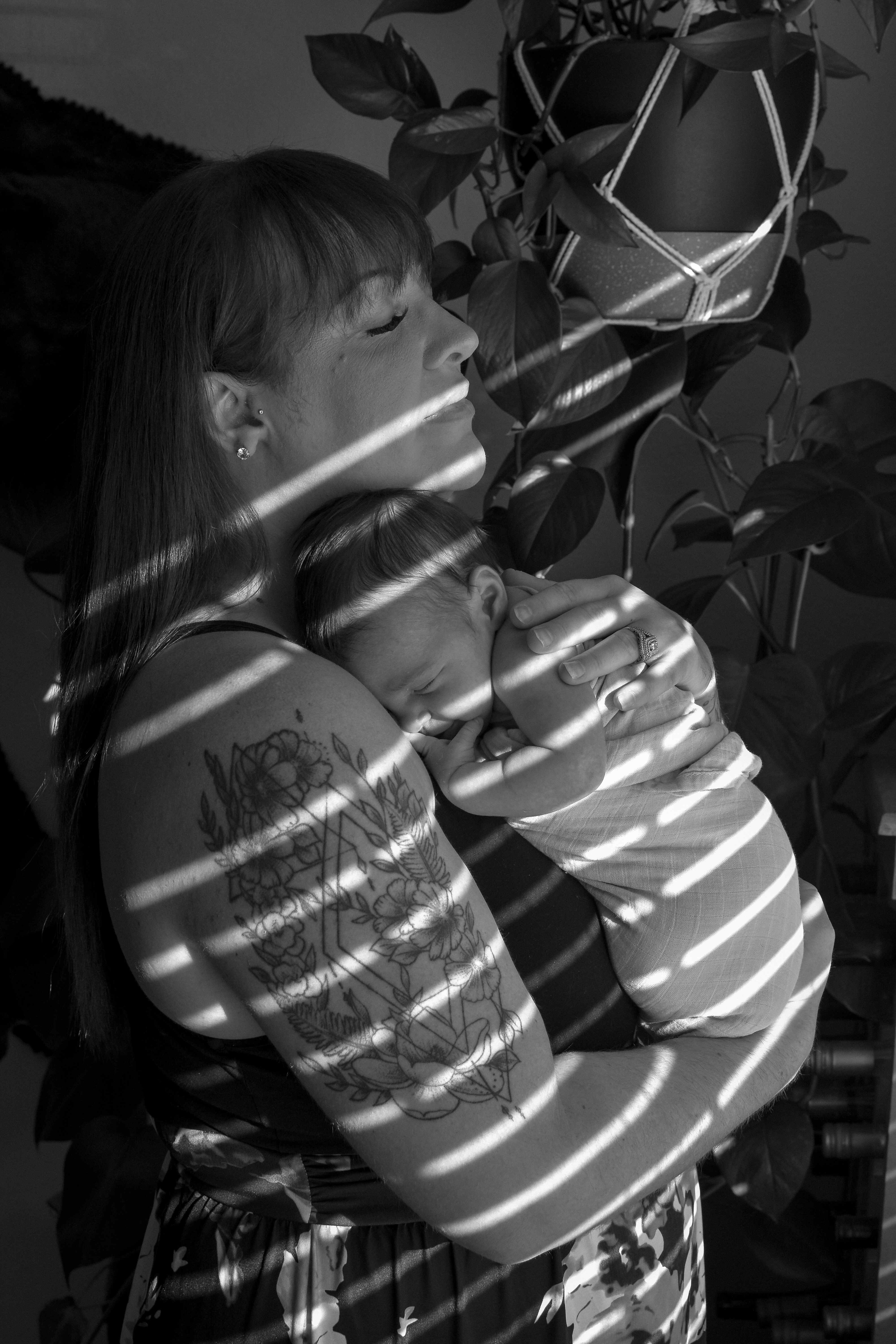 Mother with newborn in natural light